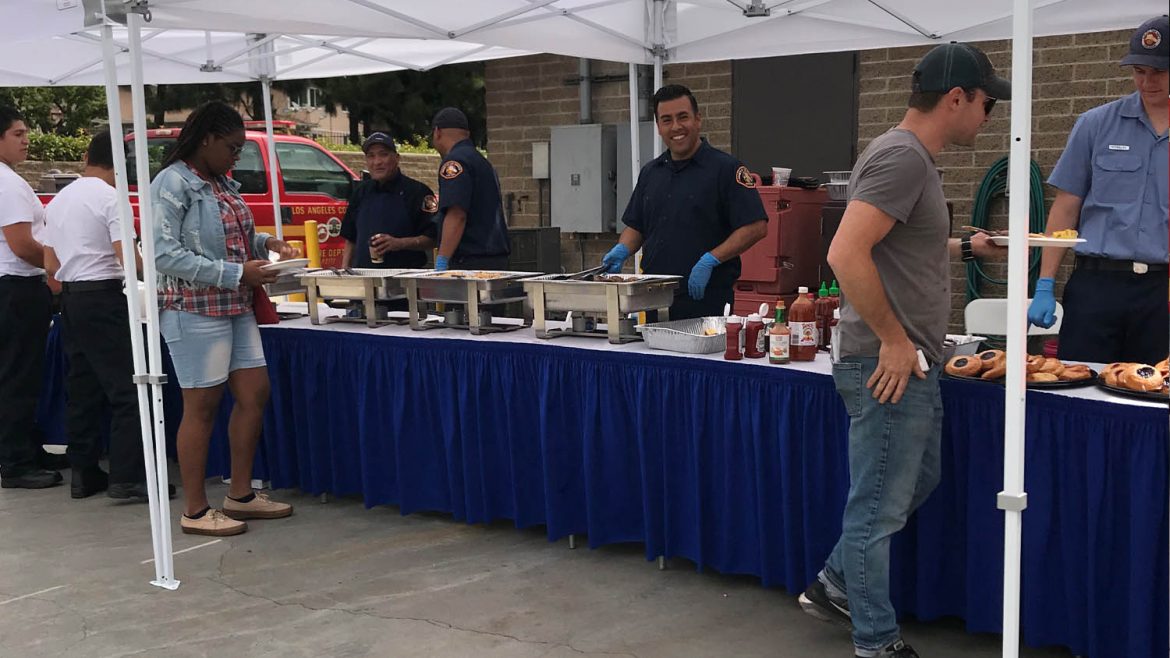 Food line at fire station 58 pancake breakfast.