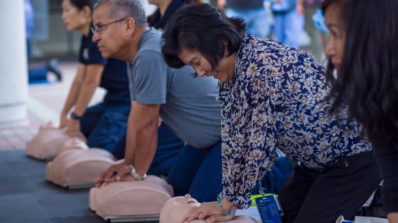 People practicing CPR.