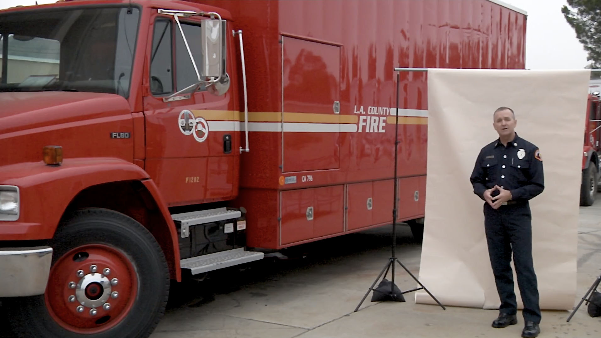Photoshoot in front of a fire truck.