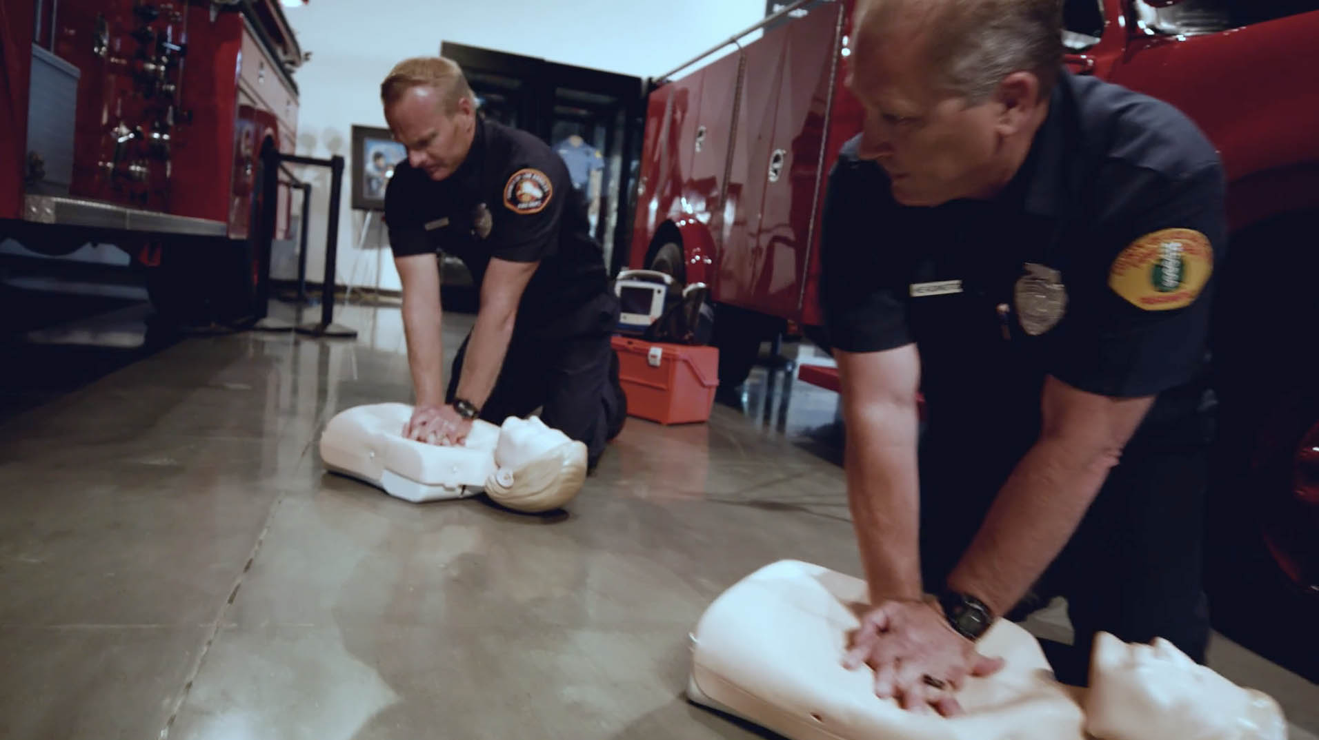 CPR being performed by Fire Fighters.