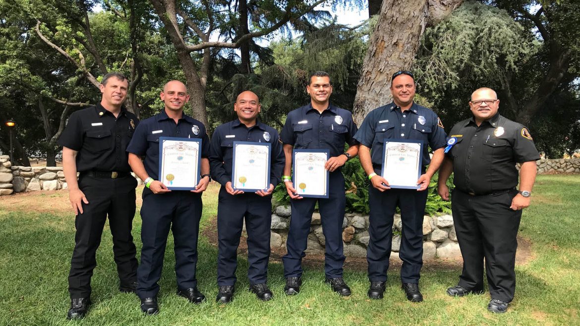 Group photo of firefighters receiving awards at the LA County Fair.