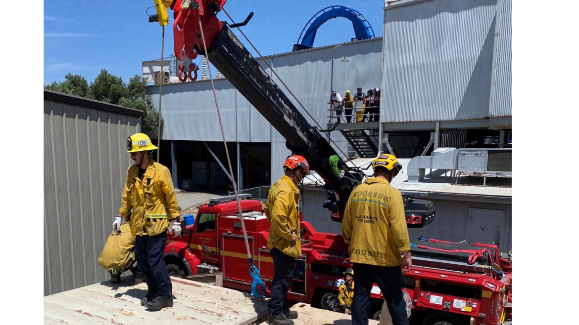 On Thursday, May 5, 2022, Engine 76 and Battalion 6 responded to a call for service involving a bear who had found its way onto the back lot of Six Flags Magic Mountain and had gotten stuck between two Conex trailers.