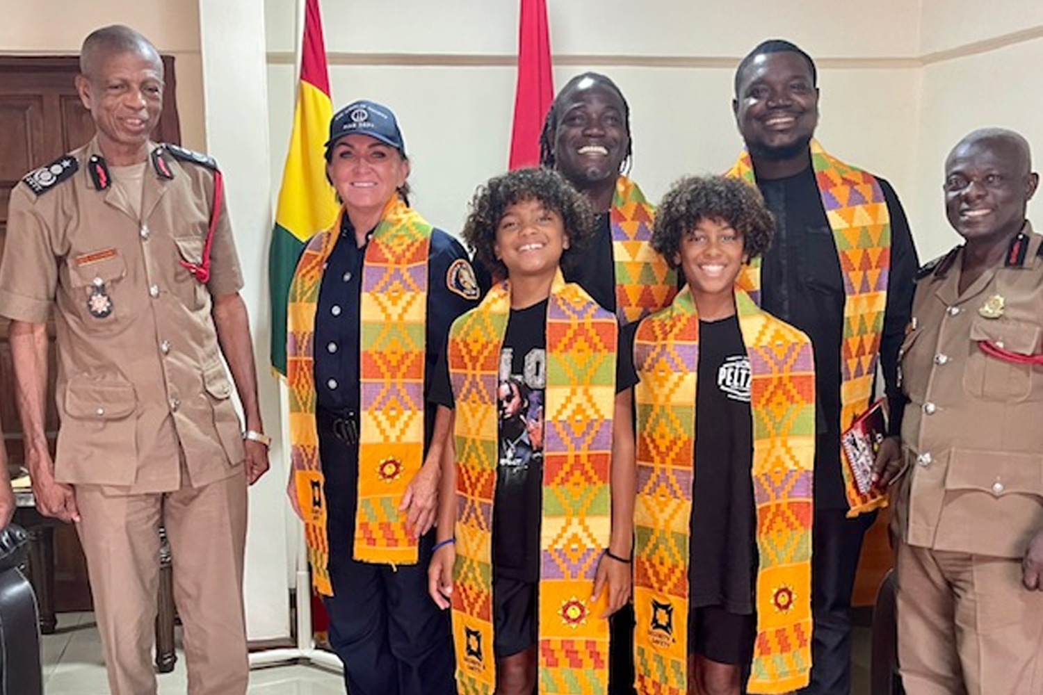 While on vacation with her family, Captain Sheila Kelliher from the Public Information Office met with the Chief of the Ghana National Fire Service.