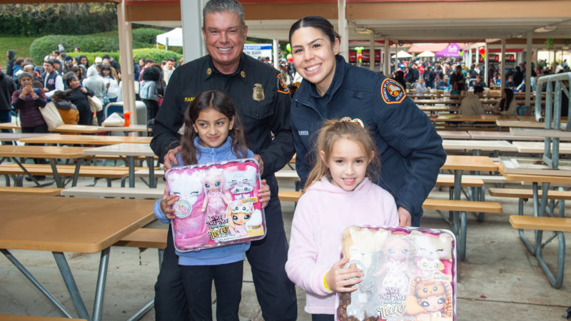 Spark of Love & Supervisor Barger at annual toy giveaway at Magic Mountain