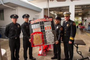 Recruit Class 171 presents class plaque to Fire Chief Anthony C. Marrone. 