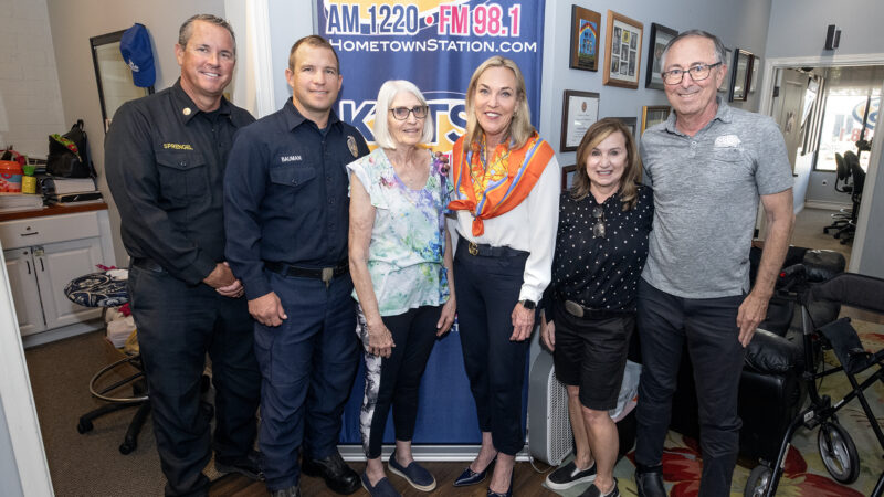 In a moment nine years in the making, KHTS FM 98.1/AM 1220 and Los Angeles County Chair and Fifth District Supervisor Kathryn Barger helped to reunite County of Los Angeles Fire Department (LACoFD) Assistant Fire Chief (AFC) Patrick Sprengel, and Fire Fighter Specialist (FFS) Connor Bauman with Donna Fink, a fire survivor who wished to express her appreciation and gratitude for the heroism and bravery of first responders during the 2016 Sand Fire.